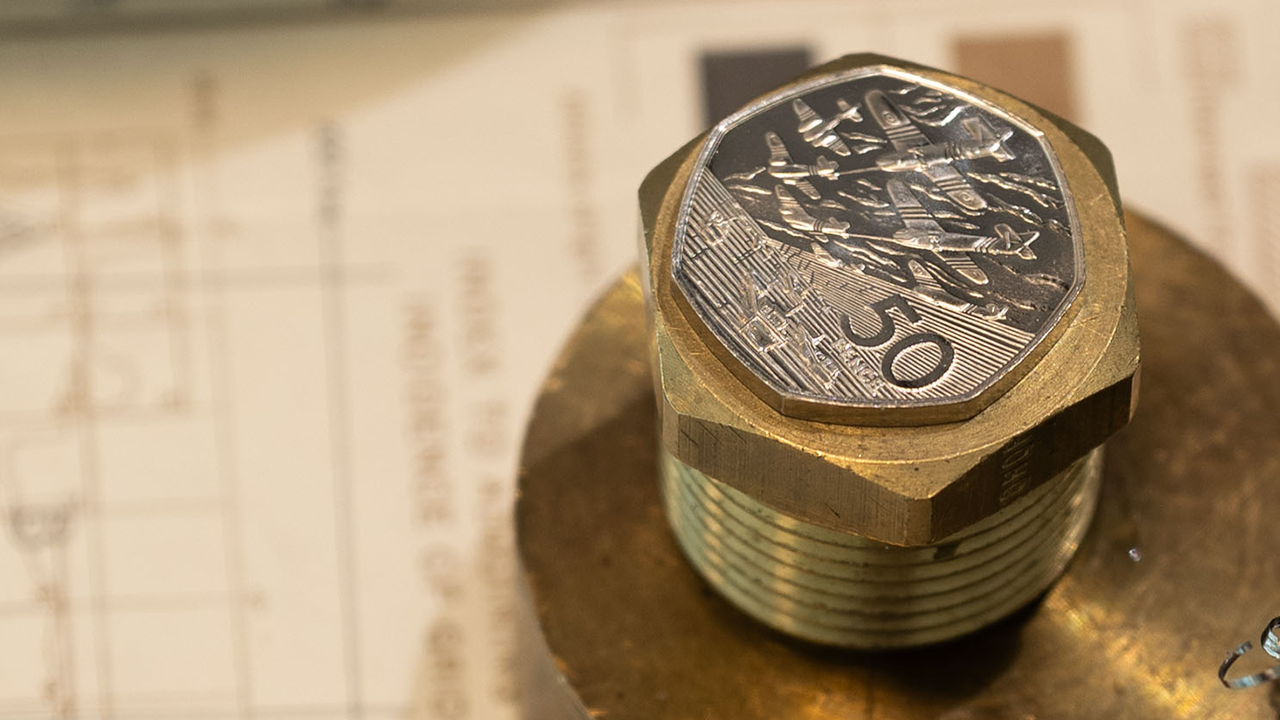 World War Two fifty cents with planes design.