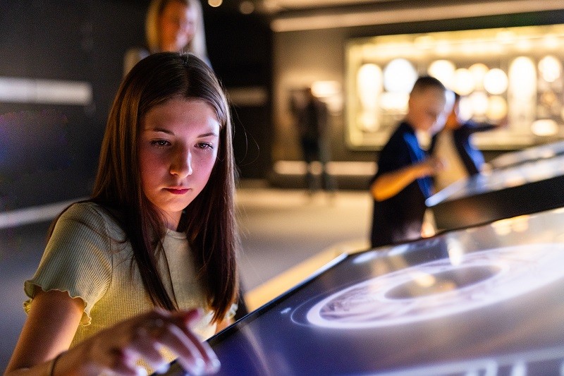 Kids playing with interactive screens
