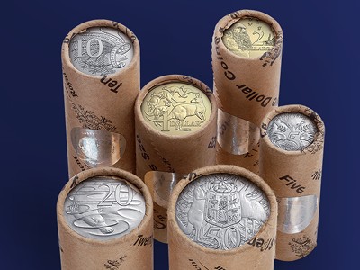 Premium coin rolls against a navy background.