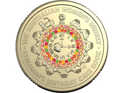 $2 coloured newsXpress till coin commemorating The Australian Women's Weekly Children's Birthday Cake Book.