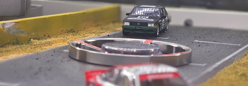 Pedal to the Medal display coin and car