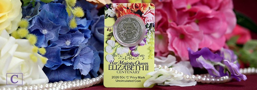 Queen Elizabeth II Privy Mark Coin in Card against a floral background.